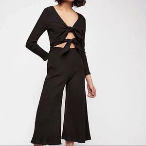 Free People black ribbed jumpsuit with cutout details